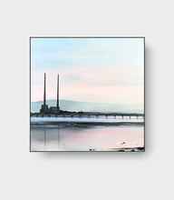 Load image into Gallery viewer, A quiet Dublin morning - Poolbeg's chimneys watch over the wooden bridge and still waters, the city's industrial past meeting the whispers of the sea.